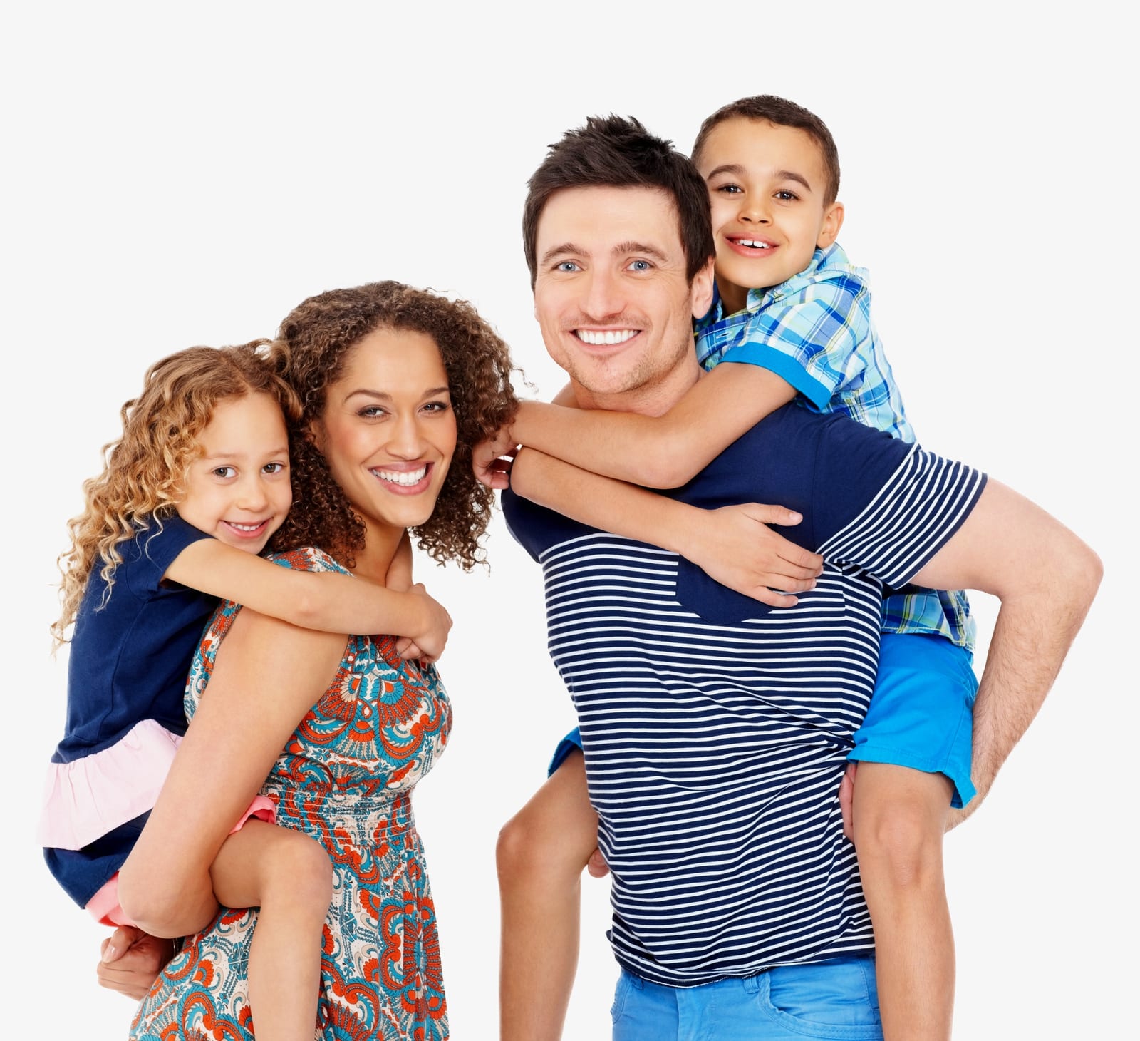 Portrait of playful young parents giving piggyback ride to children on white background
